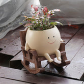 UMESONG Smily Face Planter Pot rocking chair close-up for indoor-outdoor decor with drainage