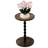 Uniqcovosa 11-inch round wood plant stand showcases a single plant elegantly.