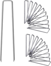 UPMCT 12-inch galvanized staples securing landscape fabric with rust resistance.