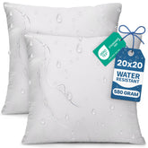 Utopia Bedding outdoor pillow insert 20x20 white pack 2 on patio sofa for versatile comfort.