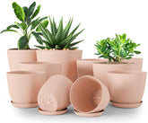 Utopia Home pink plant pots set of 10 with drainage for indoor gardening.