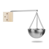 Vindar sauna oil cup positioned over heater releasing calming aroma.