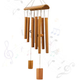 Virekm windchimes outdoors with hanging ring, elegant patio decor.