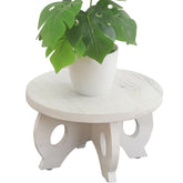 VZODESR small round plant stand in washed white elevates decor and protects surfaces.