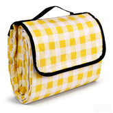 Wapodeai picnic blanket unfolded to 60x80 inches for spacious family seating outdoors.