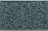WaterHog Boxwood Front Door Mat ridge design close-up captures dirt at the threshold