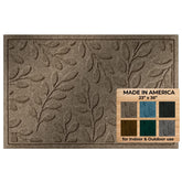 WaterHog Brittney Leaf front door mat in camel traps moisture for dry entryways