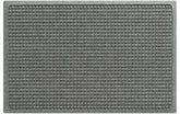 WaterHog Squares front door mat close-up shows absorbent fibers trapping moisture