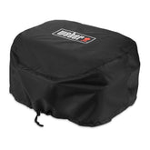 Weber Lumin cover front view protects grill from weather exposure.