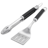 Weber precision tongs and spatula set in use for grilling precision