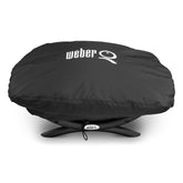 Weber Premium Bonnet Cover Q1000/100 in black, front view protects Baby Q from rain