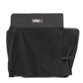 Weber Searwood 600 XL pellet grill cover front view protects from rain and sun.