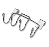 Weber tool-holder mounted on kettle keeps tongs and spatula within reach.