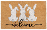 Whaline Easter doormat with white bunny silhouette greets guests at the entry.