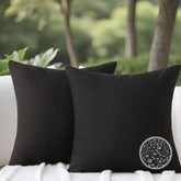 WHATWEARS outdoor pillow set on patio for stylish outdoor seating