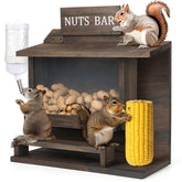 WHEARTED squirrel feeder outdoors shows durable carbonized wood construction for all-season use.