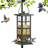 Wildpark 4-Port Bird Feeder hanging outdoors shows durable, weather-ready design for year-round feeding.
