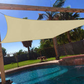 Windscreen4less sun shade sail 10x14 beige blocks sun and creates a cool backyard retreat.