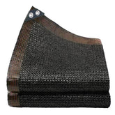 Winemana 90-percent black shade cloth over garden bed showing strong sun protection