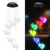 Wonderjune Easter solar wind chimes with bunny lights illuminate outdoor spaces with gentle green glow
