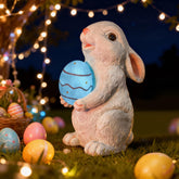 WONDHOME solar Easter rabbit statue enhances outdoor decor with LED illumination.