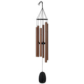 Woodstock Chimes Bronze Large Bells of Paradise setup in outdoor space for soothing harmony.