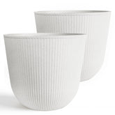 Worth garden round planter with vertical stripe texture adds contemporary style to patios.