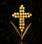 WSgift white cross garden stake with solar lights illuminating a garden path
