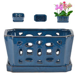 W&W Orchid Pot with holes and saucer in blue, promoting drainage for healthy roots.