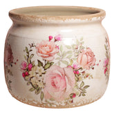 Xiaan Jiaju pink ceramic planter with rose pattern and crackle glaze for vibrant indoor greenery.