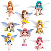 XJWWHZ miniature fairy figurine with delicate wings for garden whimsy.