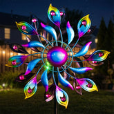 XPSCOCO solar wind spinner with peacock-feather blades adds color to garden
