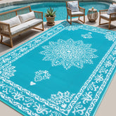 Yamaziot outdoor rug 8x10 teal boho front view creates inviting patio ambience.