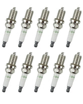 YIGUCS RC12YC spark plug close-up of ceramic tip for reliable ignition.