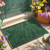 Yimobra leaf-pattern groove front door mat traps mud and debris at the doorway.