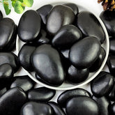YISZM black pebbles closeup for decorative accents and modern landscaping