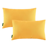 YOOZEKU outdoor-yellow-lumbar-pillow on patio seating provides supportive comfort.