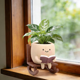 YOUOIVIA rocking-chair book planter with smiley face for cozy home display