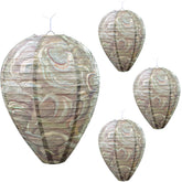 ZeeDix wasp nest decoy hangs under eaves to deter pests.