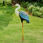ZioWio crane garden statue in blue tones enhances outdoor ambiance.