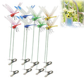 ZLMC outdoor 3D dragonfly clip with adjustable wings on a plant.