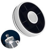 ZMTECH solar light mounted on a flag pole for night visibility.