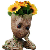 ZUSONUD Baby Groot pen pot on a tidy desk for organized writing tools.