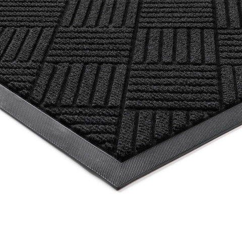 100pointONE front door mat shows heavy-duty texture capturing mud at entry.