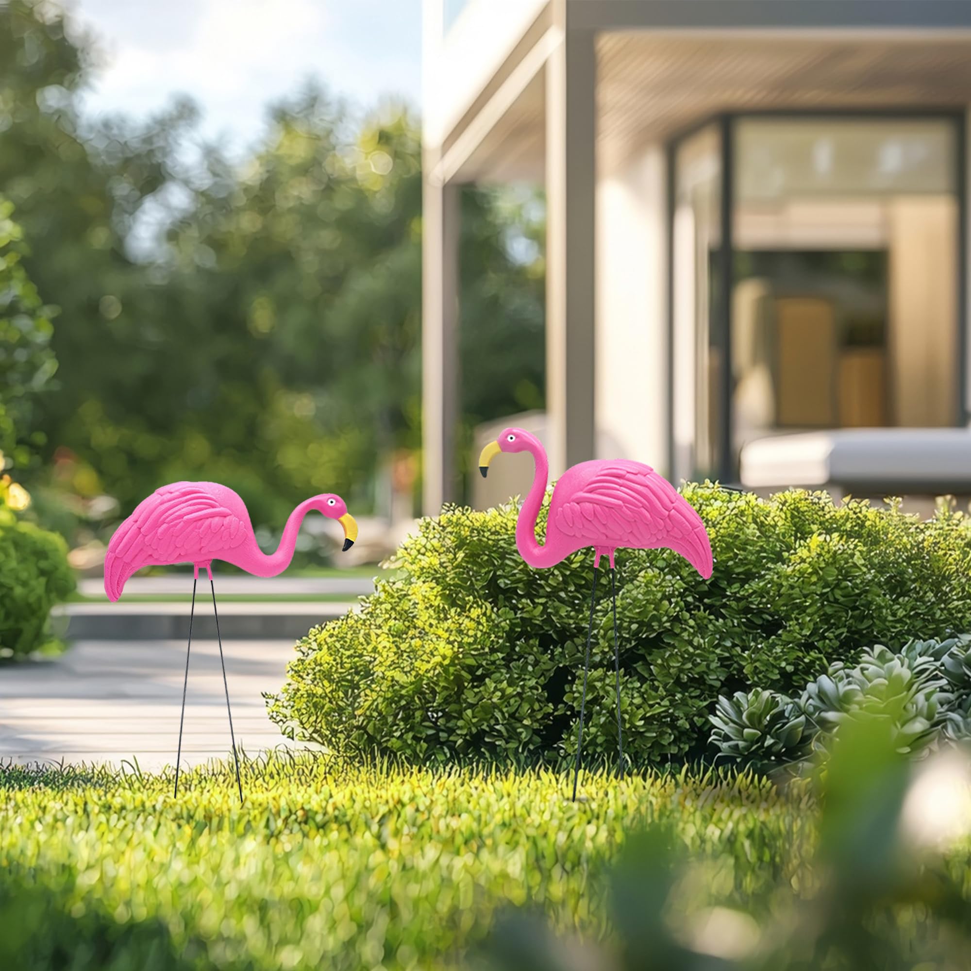 4E's Novelty pink flamingo yard statue with 21-inch legs stands firmly outdoors.