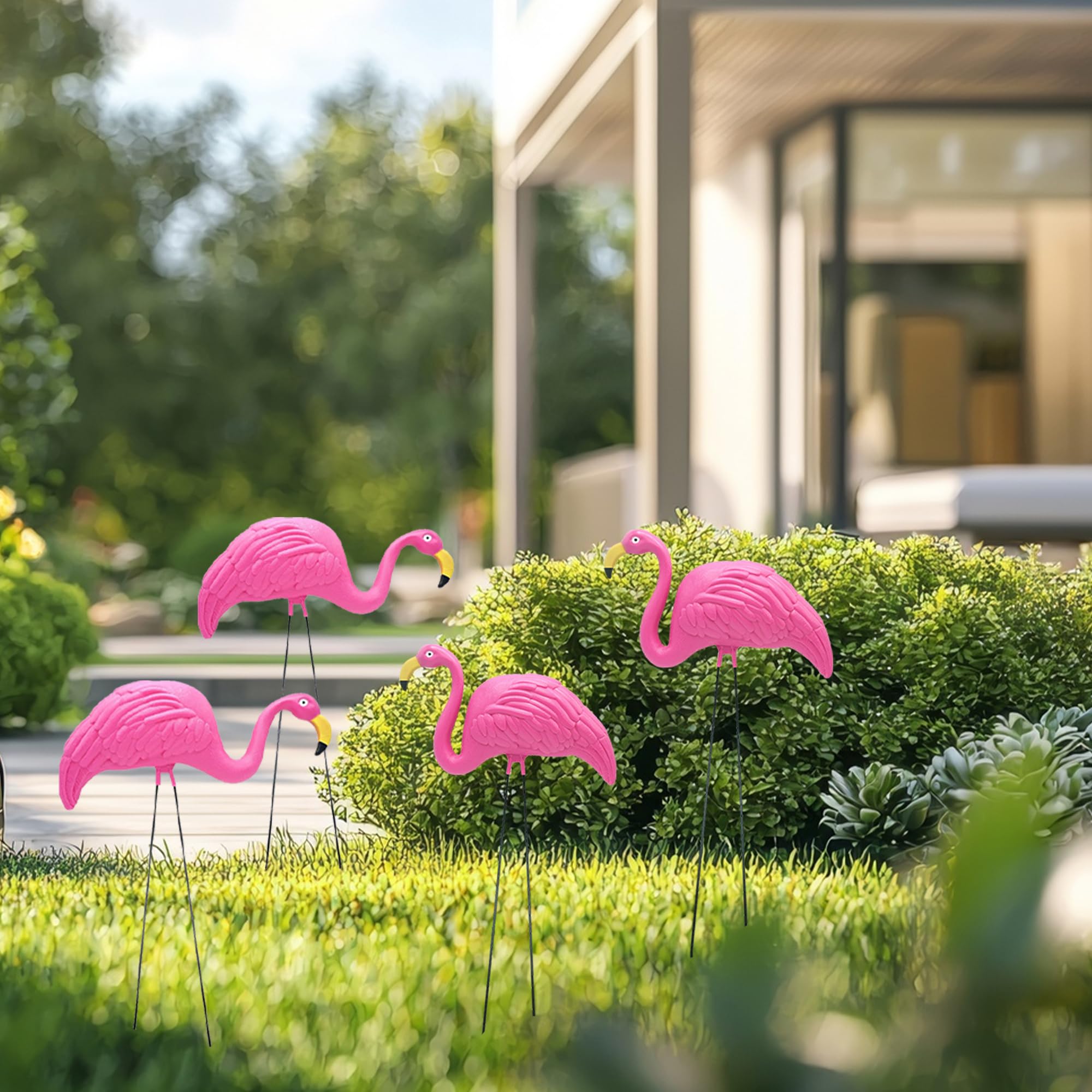 4E's Novelty pink flamingos provide sturdy yard decor for weathered days.
