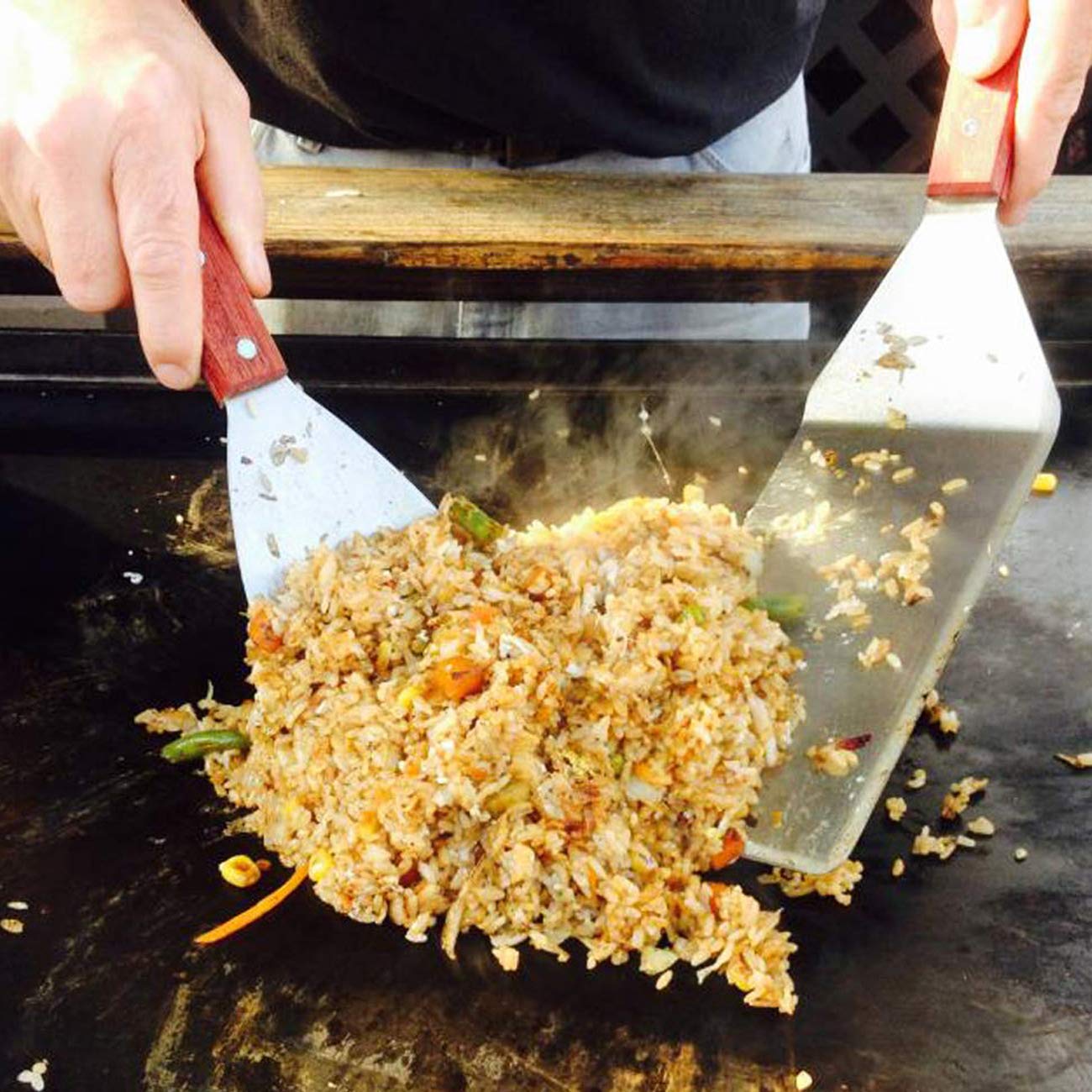 Acronde easy clean hibachi scraper helps remove stuck on food with a slanted design.