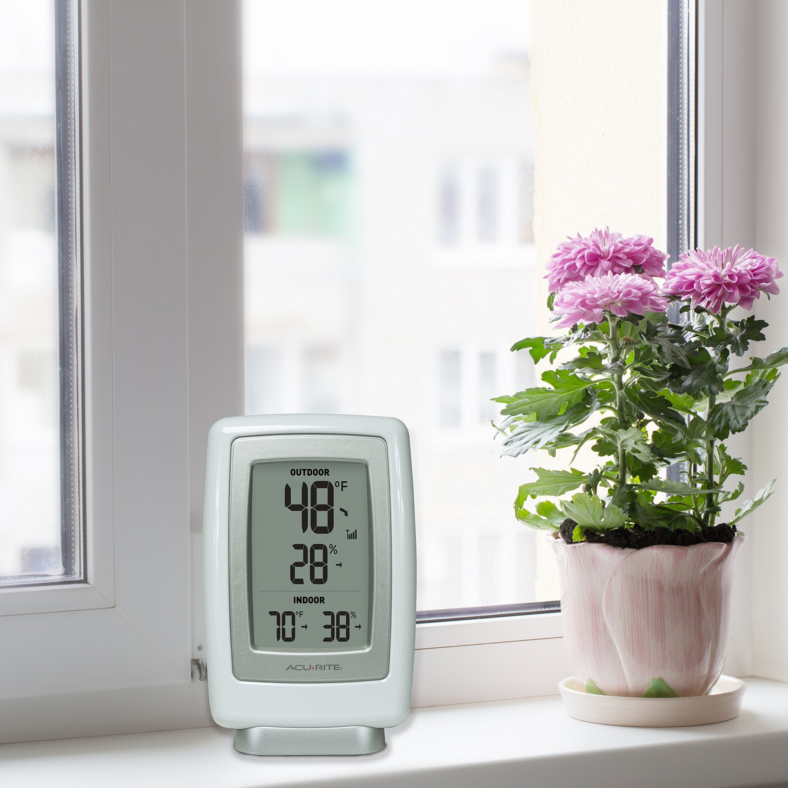 AcuRite 00611 wireless sensor and hygrometer capture humidity levels for home comfort.