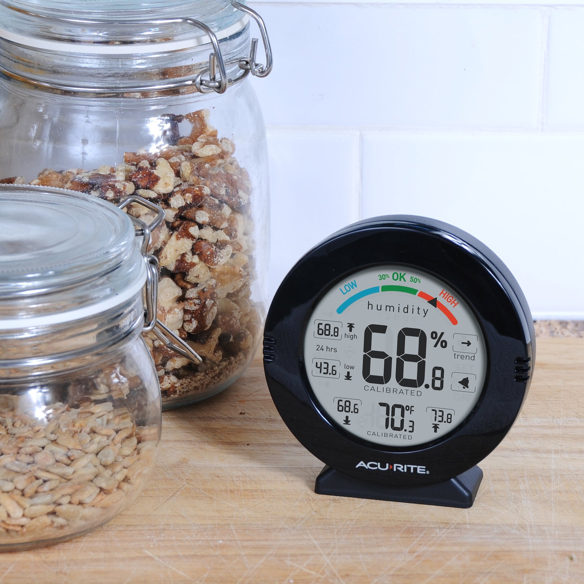 AcuRite 01080M alarm setup enables programmable humidity alerts.