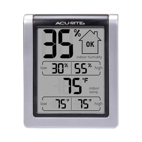 AcuRite indoor thermometer and hygrometer display shows temperature and humidity clearly.